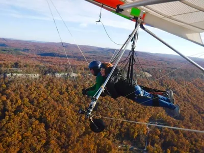 Hang-gliding over fall colors