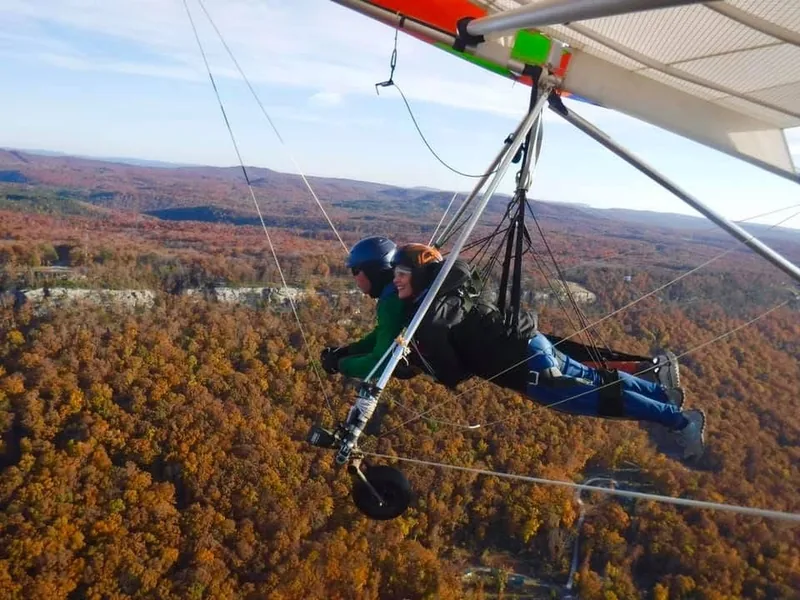 Jan hang-gliding over fall colors