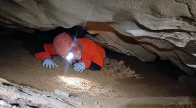 Squeezing through a cave